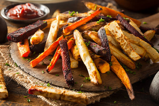 Oven Baked Vegetable Fries Oven Baked Vegetable Fries with Carrots, Potato, and Beets sweet potato french fries stock pictures, royalty-free photos & images
