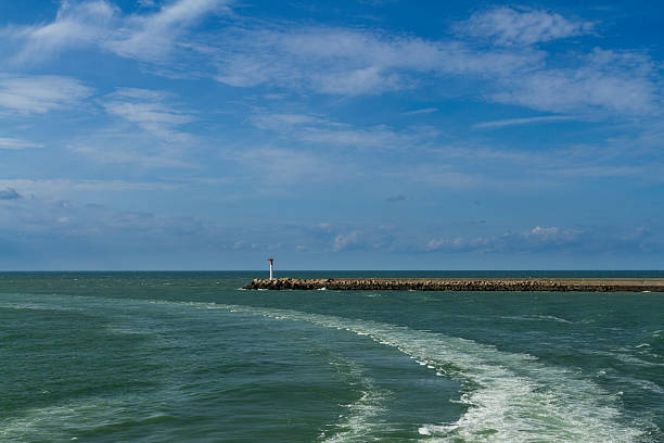 istock Dunkirk, modern day entrance to harbour. 516251053