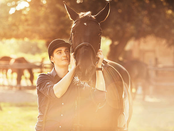 istock Young Jockey and His Horse 516251809
