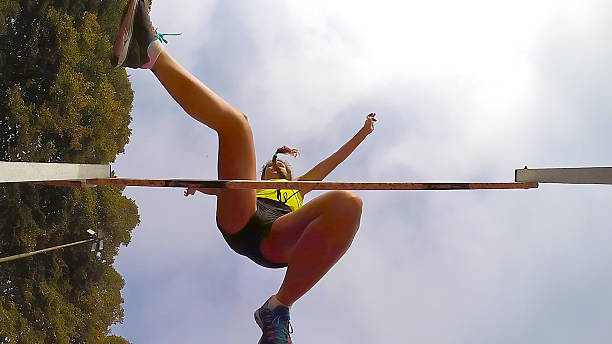 istock Young woman jump during Hurdle Race 516252717