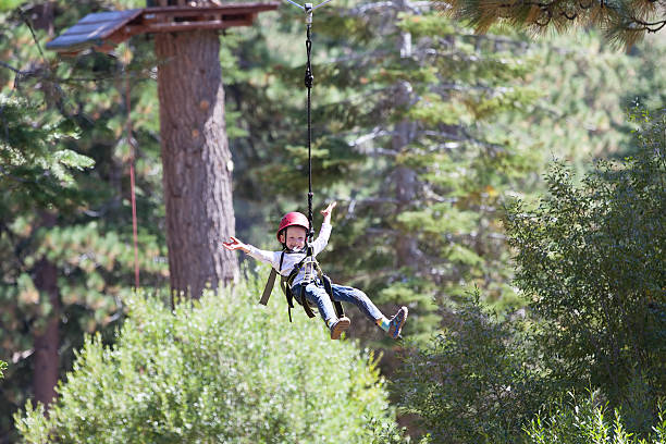 kid in adventure park stock photo