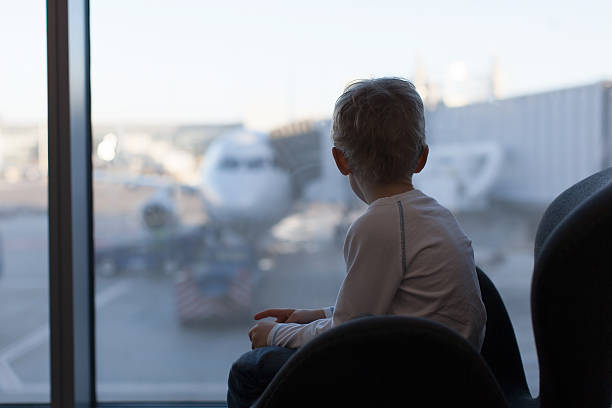 istock kid at airport 516252787