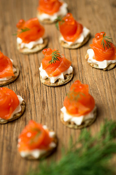 istock Smoked Trout Canapes on a wooden table 516255426