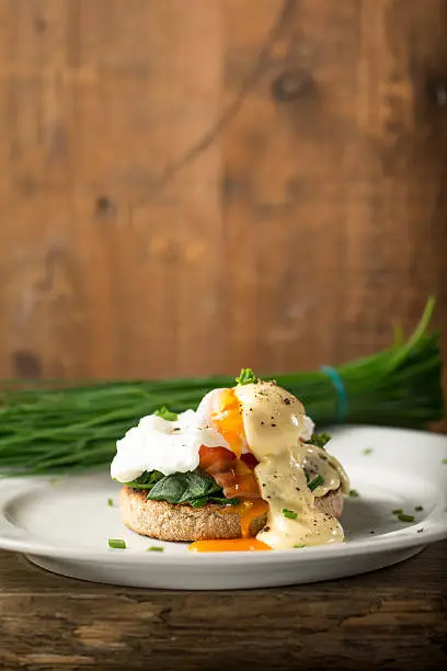 Photo of Runny Egg Yolk on Smoked Salmon Muffin