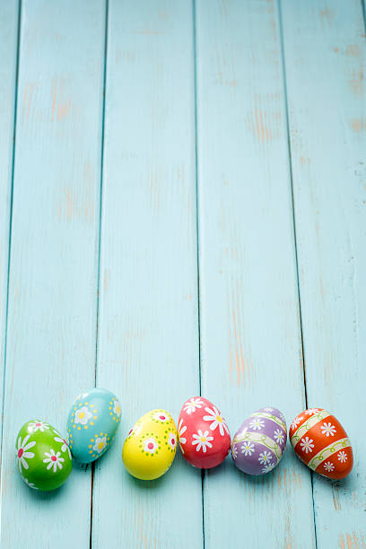 istock Beautiful Easter Eggs on a Retro Powder Blue Wood background. 516258020