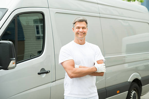 istock Painter With Arms Crossed In Front Of Van 516260284