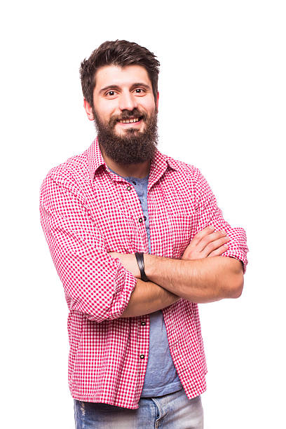 istock Handsome young man with beard with crossed hands 516260534