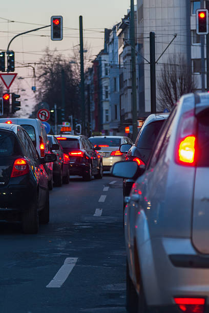 istock city traffic at dusk 516260544