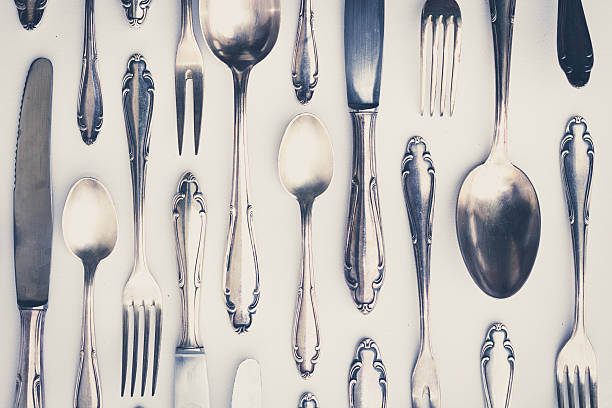 istock beautiful old silver cutlery - vintage style filter 516264446