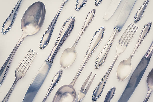 istock beautiful old silver cutlery - vintage style filter 516264494