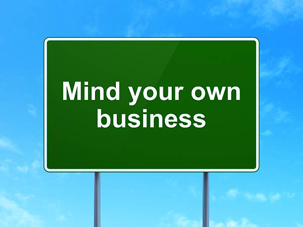istock Finance concept: Mind Your own Business on road sign background 516264604