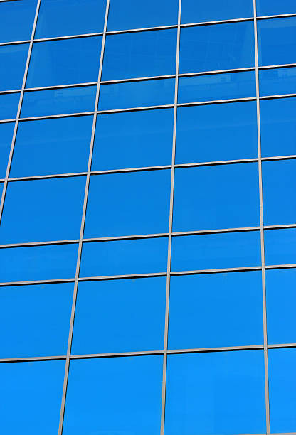 istock Glass windows of a big building 516264806