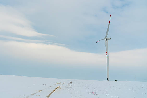 istock Windmill on the field in winter 516265706