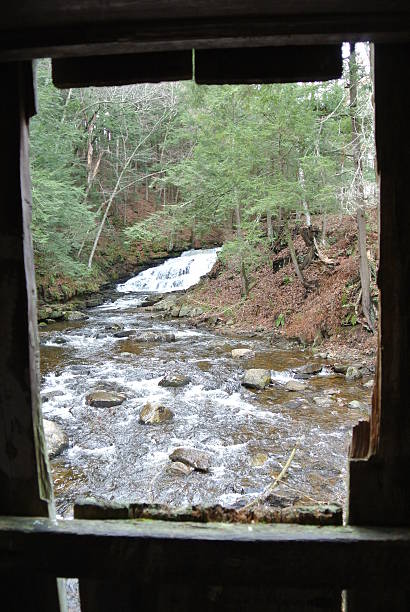 istock Covered Bridge Window View of Creek 516280758