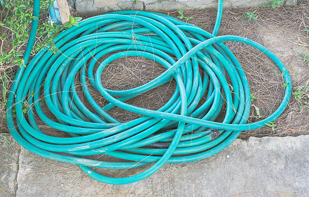 istock roll of water hose 516280781