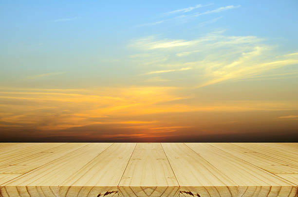 istock Picnic wood table and Blurred Sunrise Background. 516281024