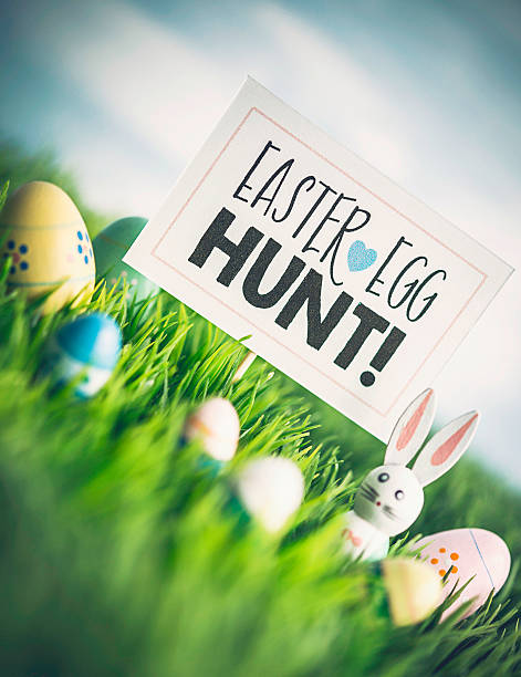 istock Easter egg hunt with vintage wood bunnies and Easter eggs 516281612