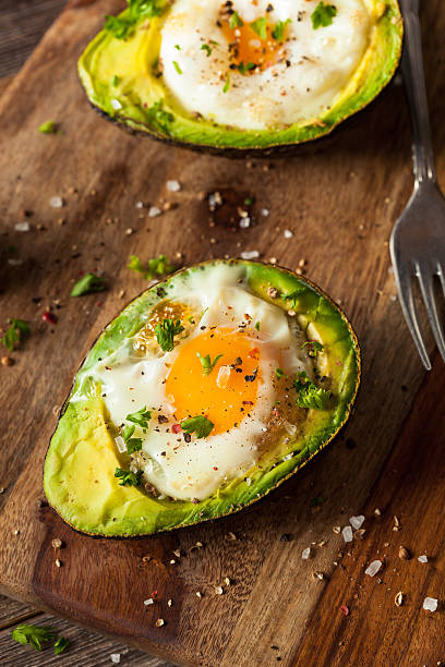 istock Homemade Organic Egg Baked in Avocado 516283310