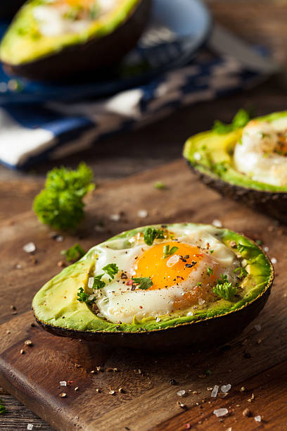 istock Homemade Organic Egg Baked in Avocado 516283318