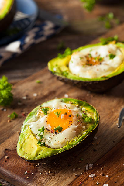 istock Homemade Organic Egg Baked in Avocado 516283322