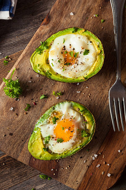 istock Homemade Organic Egg Baked in Avocado 516283372