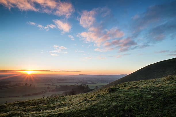 istock Stunning Autumn sunrise over countryside landscape 516284055