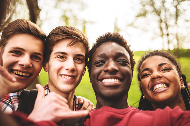 istock Group of college student laughing and doing a selfie 516285223