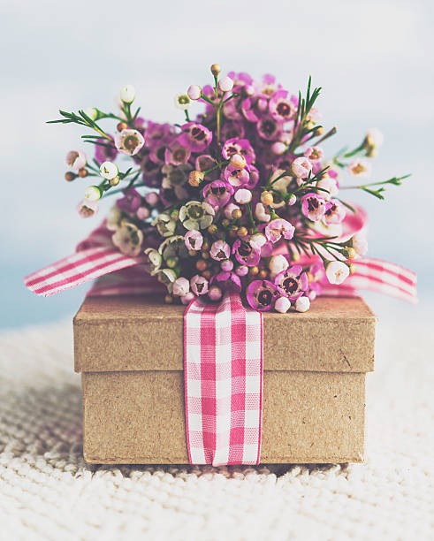 istock Mother's Day gift with beautiful flower bouquet 516285254