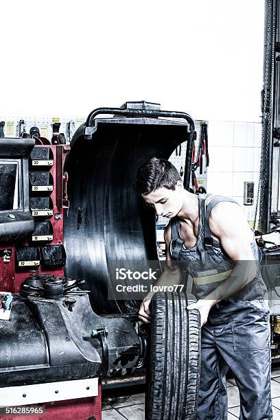 Wheel Balancing Stock Photo - Download Image Now - Craftsperson, Modern, Sparse