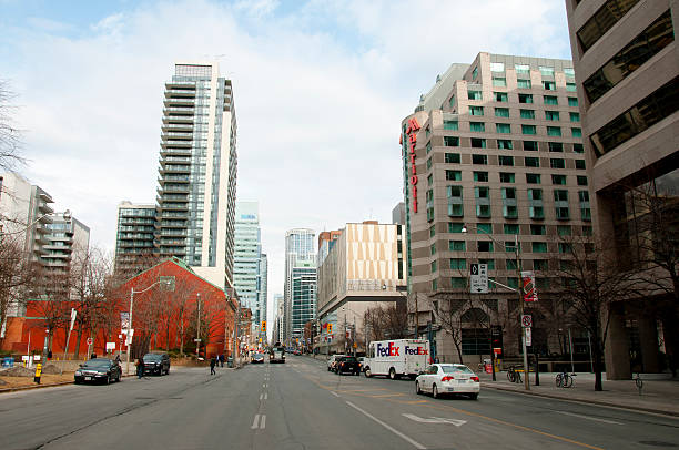 Toronto - Canada Toronto, Canada - March 9, 2016: Bay street in downtown Toronto looking north and running parallel to Yonge street toronto dundas square stock pictures, royalty-free photos & images