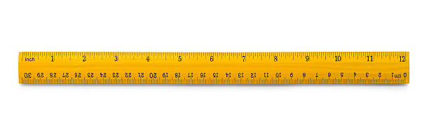 Yellow wooden ruler Picture of yellow wooden ruler isolated on white background Ruler stock pictures, royalty-free photos & images