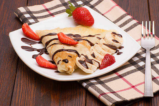 istock Crepes with Banana and strawberries 516288474