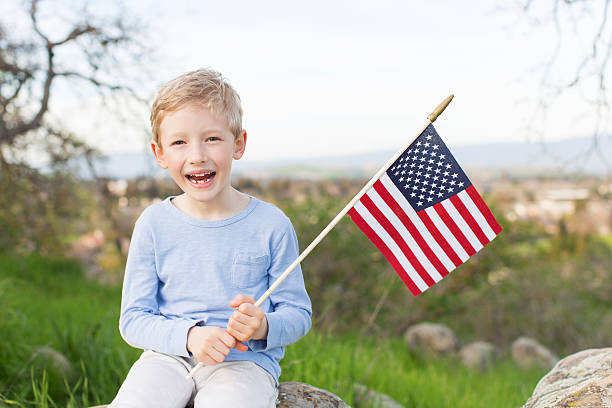 istock kid celebrating 4th of july 516289254
