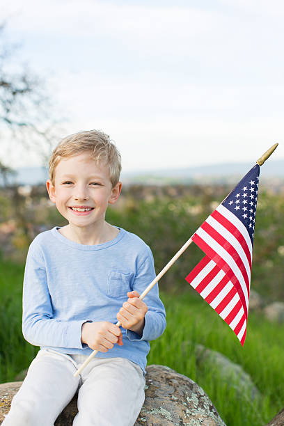 istock kid celebrating 4th of july 516289272