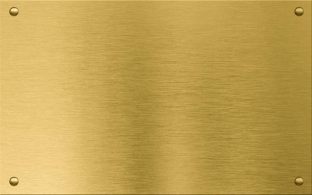 istock gold metal plaque or nameboard with rivets 516289726
