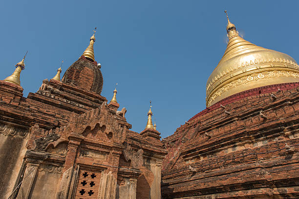 Dhamma Ya Zi Ka Pagoda in Bagan, Myanmar Dhamma Ya Zi Ka Pagoda in Bagan, Myanmar golden tample stock pictures, royalty-free photos & images