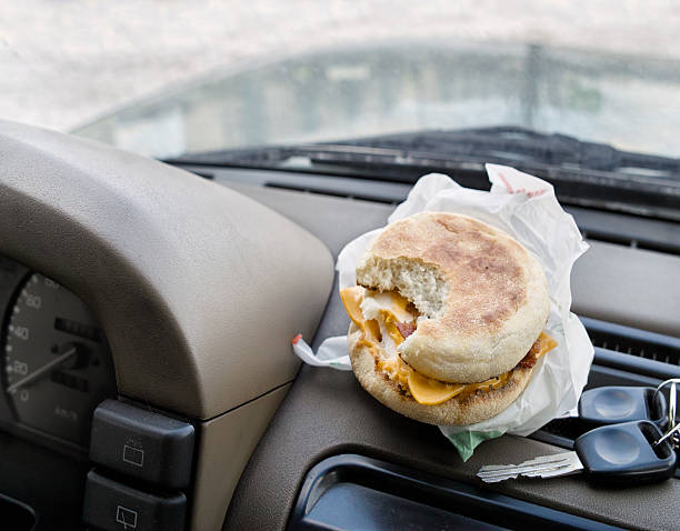 Snack While Driving stock photo