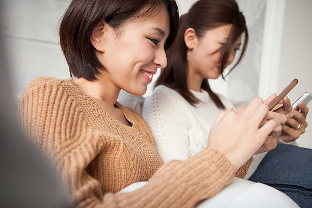 istock Two women have seen the smartphone at home 516292230