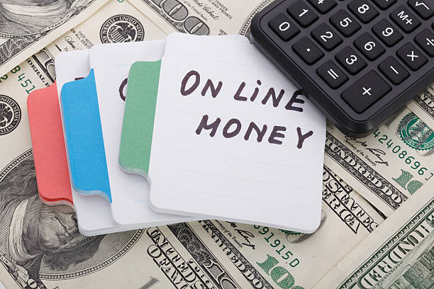 istock Concept write - On line money. Sign lays with calculator 516295758
