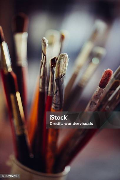 Collection Of Dirty Old Artists Paintbrushes In A Container Stock Photo -  Download Image Now - iStock