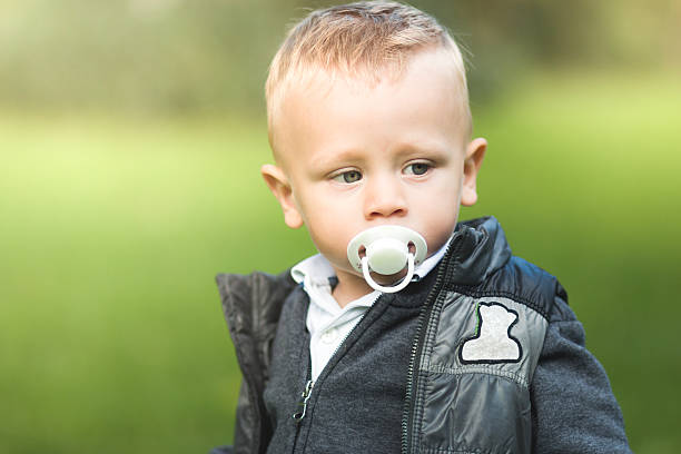 Baby Boy With Pacifier stock photo