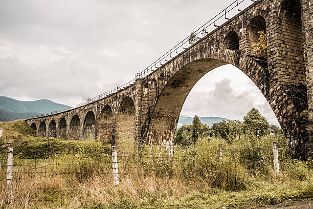 istock Old railway bridge in Carpathian mountains 516317971