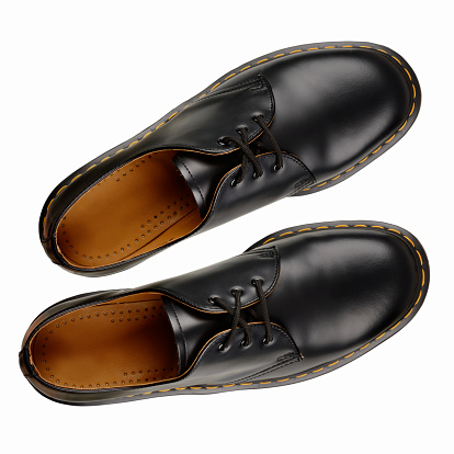 Black leather men shoes on white background. With clipping path