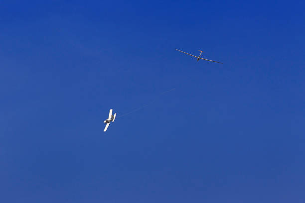 istock Glider towed by an aircraft 516319609