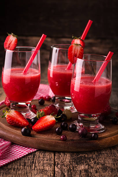 istock fresh smoothie with fruit and berries, on wooden background 516319646