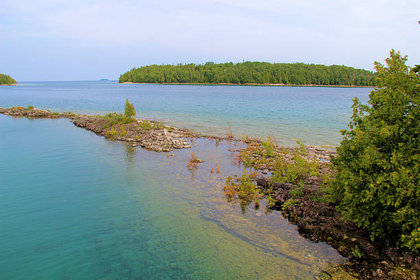 Small Islet Small Islets in Tobermory, Ontario sandbanks ontario stock pictures, royalty-free photos & images