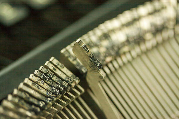 istock Hammer keys on an old type writer 516323120