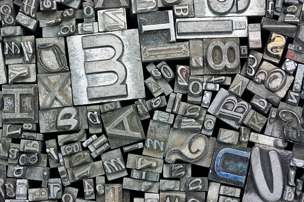 istock Close up of typeset letters 516323320