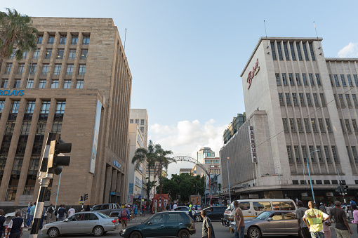 Harare, Zimbabwe - March 15, 2016: The Barclays office building in Harare, capital of Zimbabwe, at business closing time. The UK banking group recently announced its intended sale of its 62.3% stake in Barclays Africa Group due to its dilution of Barclays group returns. Barclays has had operations in parts of Africa for almost a century. Barclays is now likely to also sell its operations in its Egyptian and Zimbabwean operations after negotiations to sell these to its South African subsidiary broke down.