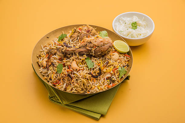 istock authentic chicken biryani with onion raita 516329084